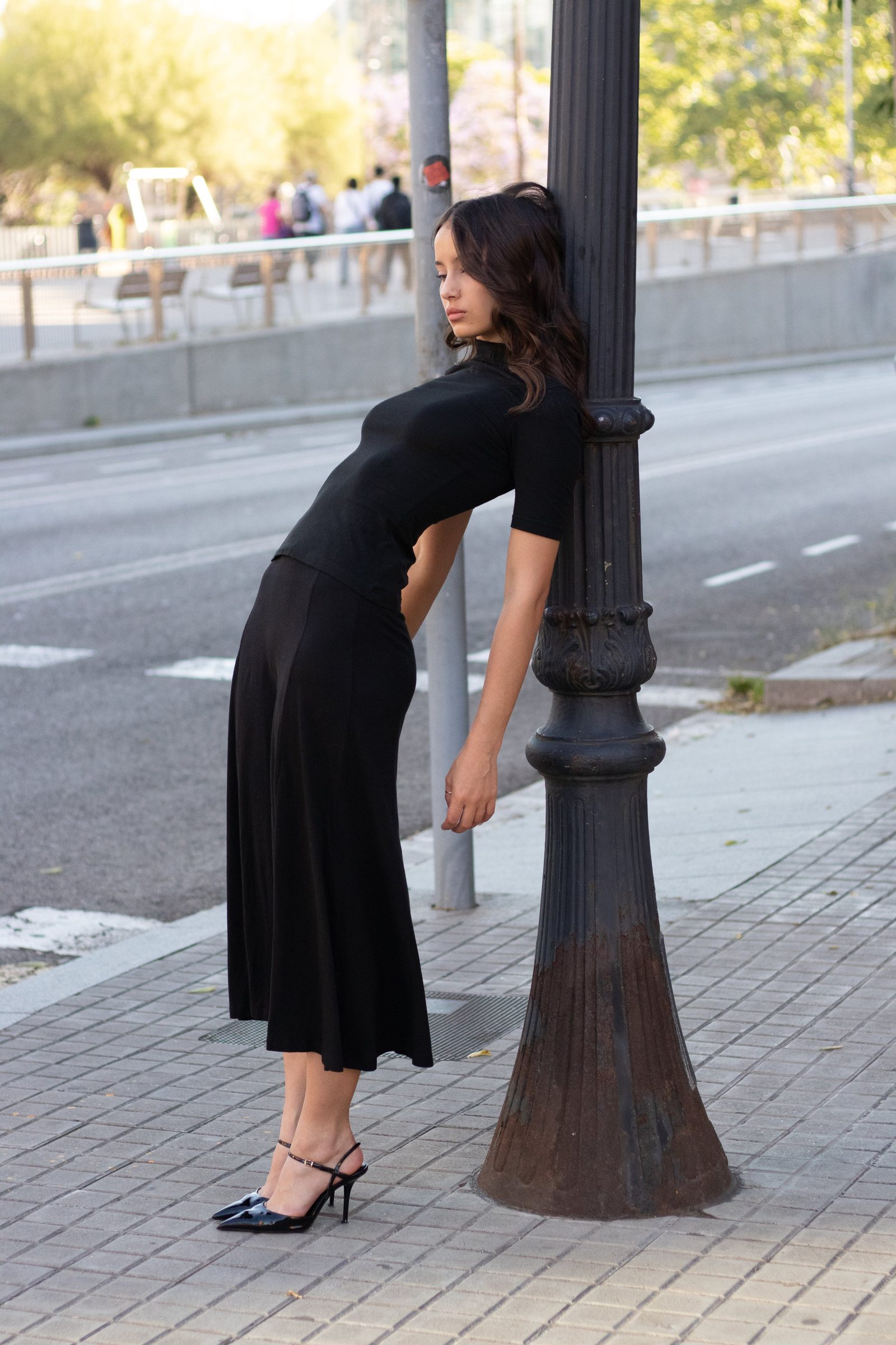 Street portrait in a black dress