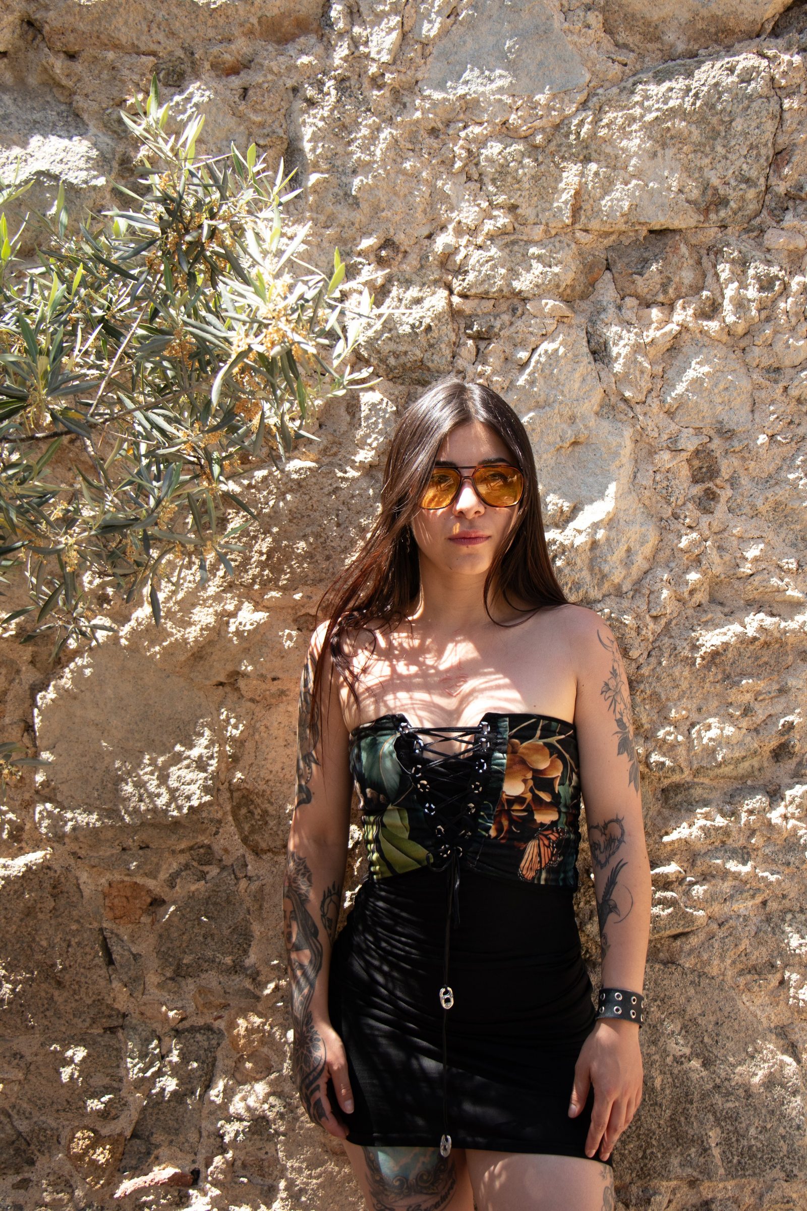 Portrait against a stone wall