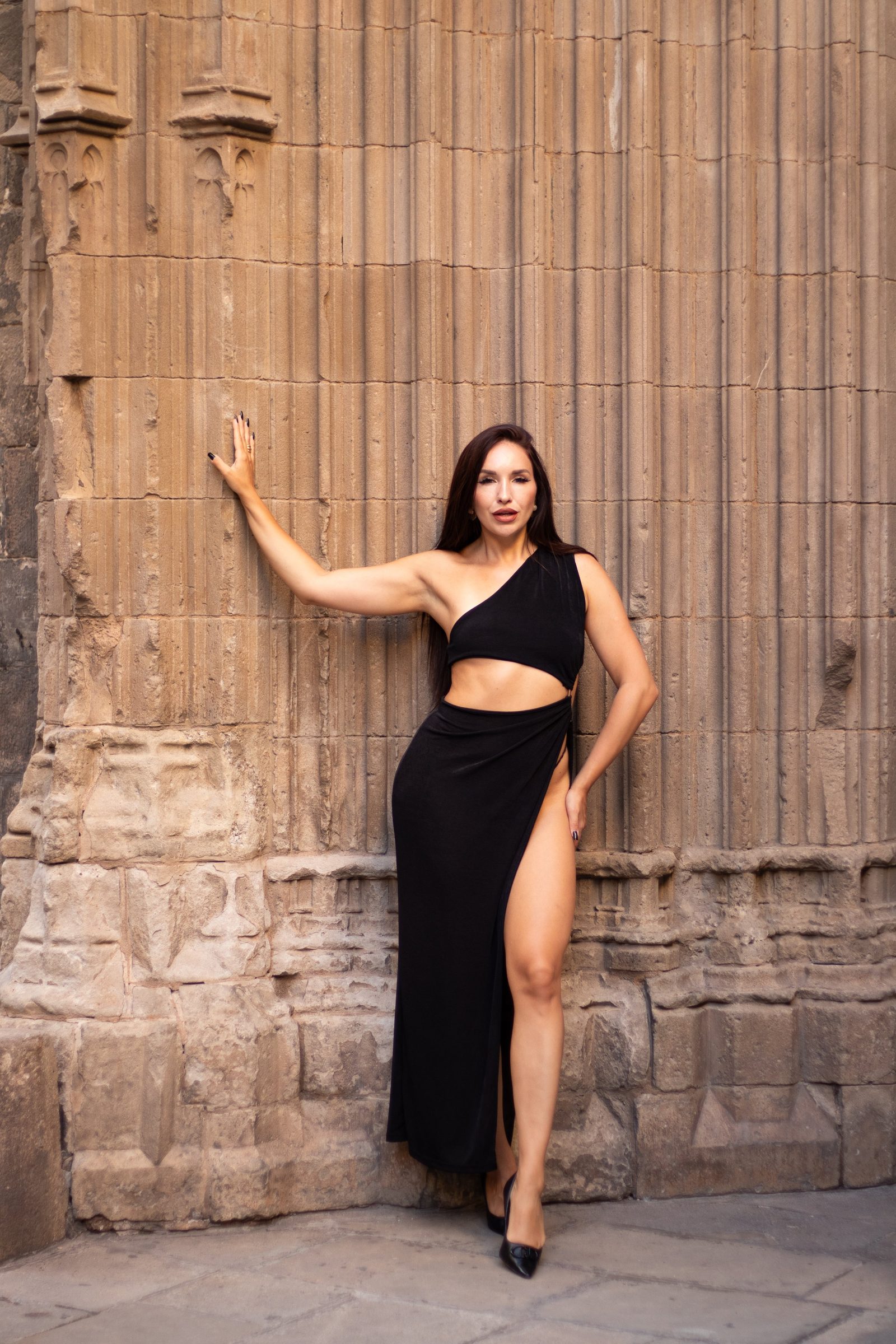 Portrait against stone columns