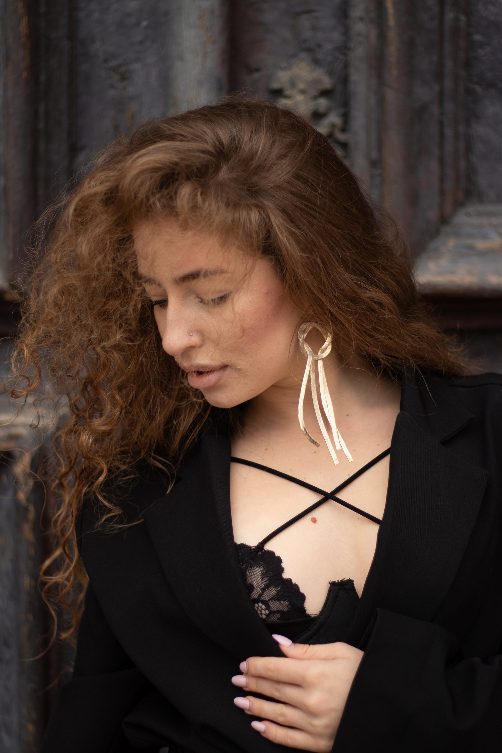 Close portrait with large earrings